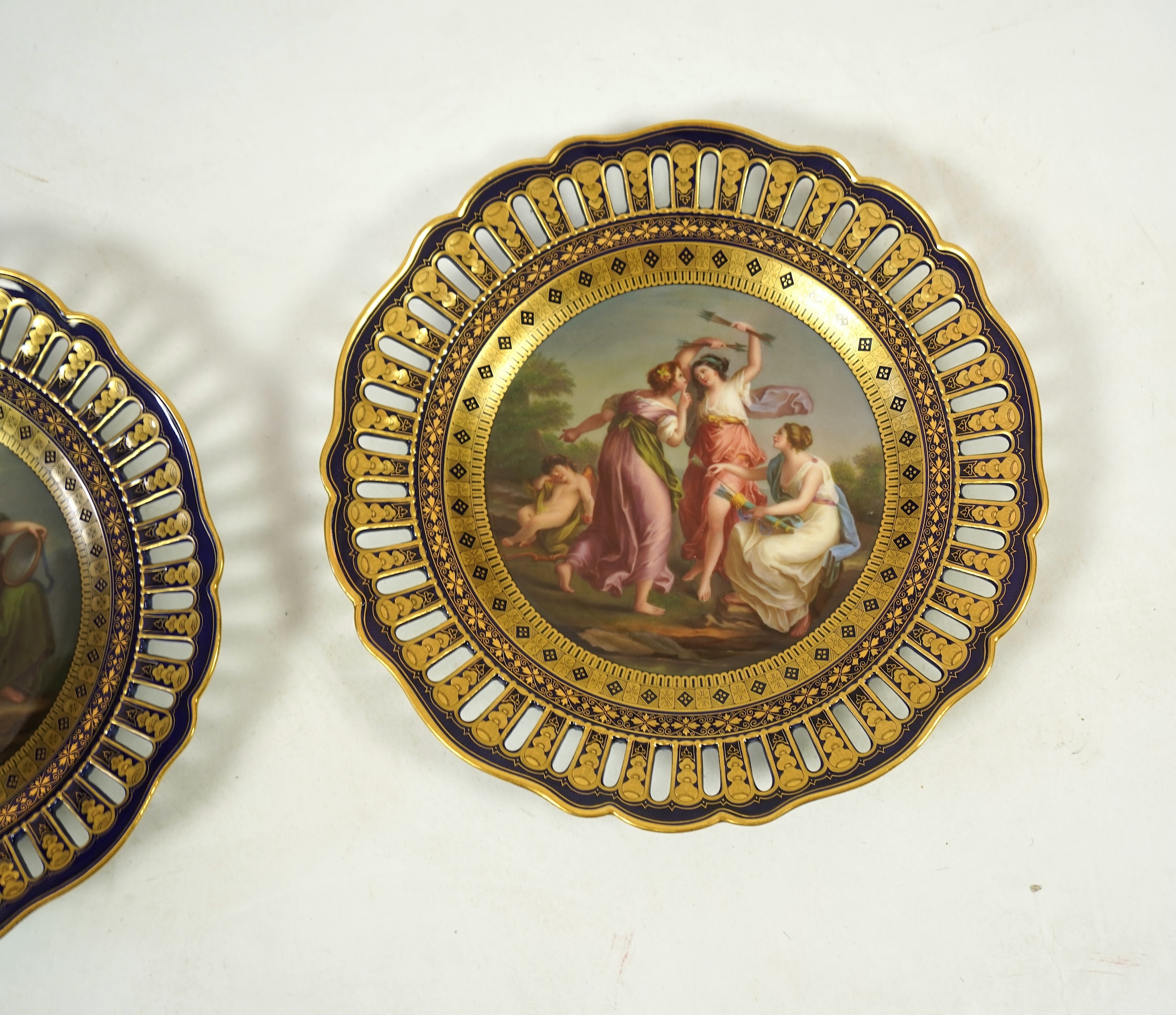 AMENDMENT - A near pair of 19th century Meissen 'Three Graces' cabinet plates, after Angelica Kaufmann